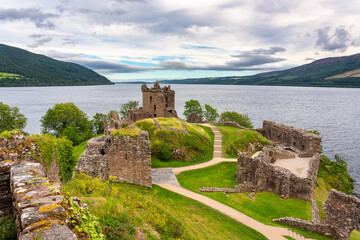 Fototapeta na wymiar Ruins of the medieval Urquhart Castle located next to Loch Ness in Scotland, UK.