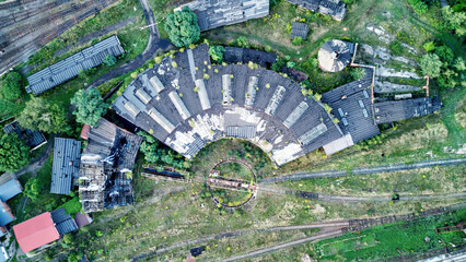 Aerial view of an abandoned locomotive repair facility.