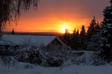 Fototapeta na wymiar Sunset sky in a polar swedish village