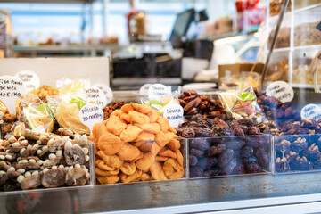 Nuts and dried fruit stall in a traditional market.