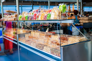 Nuts and dried fruit stall in a traditional market.