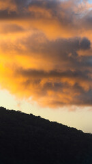 contrast photo between sunset and mountain