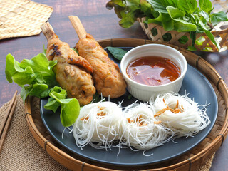 Chao Tom - Vietnamese food of Fried Shrimp sugar cane served with vermicelli, sweet sauce and...