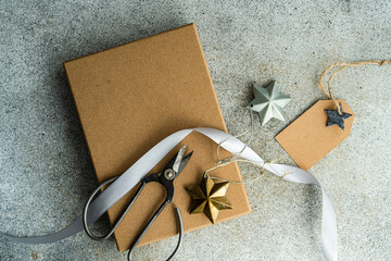 Holiday gift wrapping with scissors