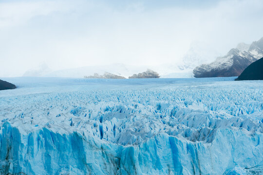 Amazing view of turquoise ice glacier lake with mountains