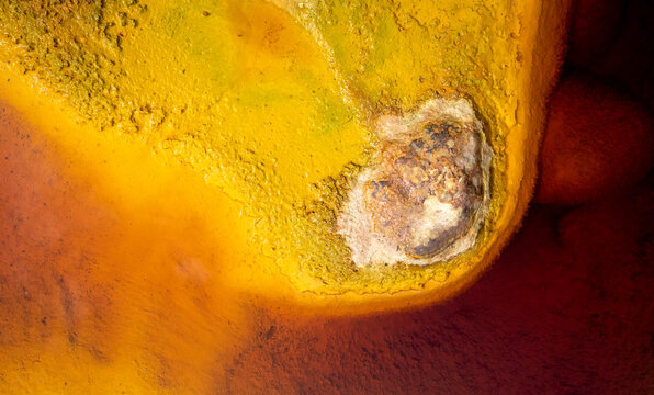 Surface of stone with yellow abstract texture background