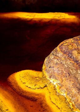 Surface of stone with yellow abstract texture background