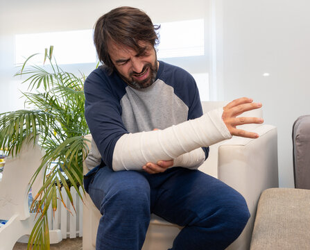 Man with bandages having arm pain