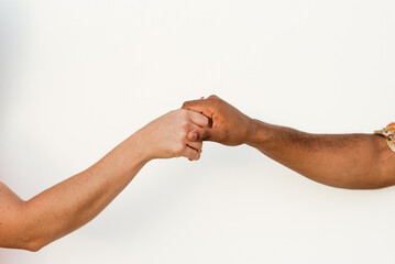 Crop diverse couple giving high five to each other