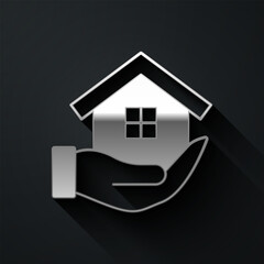 Silver House in hand icon isolated on black background. Insurance concept. Security, safety, protection, protect concept. Long shadow style. Vector