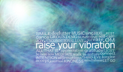 Healing Words to Raise Your Vibration from the Light Source Wall Art - white light from from blue teal energy background with a  word cloud relevant to spirituality and raising your vibration

