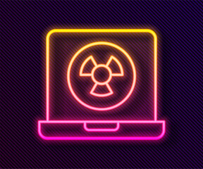 Glowing neon line Nuclear laptop icon isolated on black background. Vector