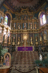 Fototapeta premium Saint Jean de Luz, France - Dec 24, 2022: Interior of St. John the Baptist church (Eglise Saint-Jean-Baptiste)