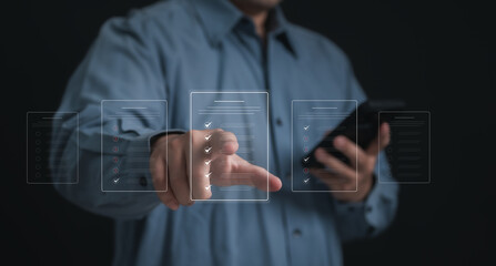 Performance checklist concept : businessman using stylus pen with laptop for questionnaire, evaluation, assessment online or survey exam and filling out for digital survey and checklist.