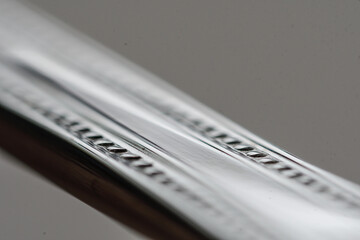 Closeup of the engraving on a metal handle