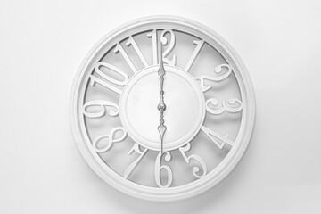 Circle clock on white background wall