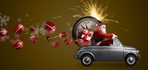 Christmas is coming. Santa Claus on toy car delivering New Year 2024 gifts and countdown clock at blue background with fireworks