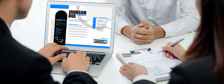 Candidate in job interview with human resources manager at office desk having oratory conversation for search person to fill vacant hiring position . Professional HR specialist interview candidate .