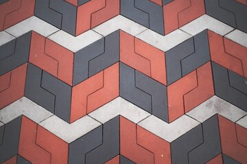 Red, black and white pavement pattern