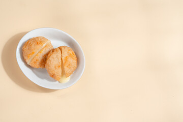 Pempek is a savoury Indonesian fishcake delicacy, made of fish and tapioca from Palembang. Pempek is served with sweet and sour sauce.