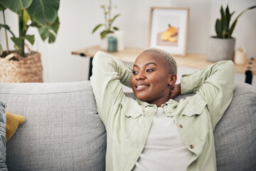 Black woman, relax and calm stretching on sofa in home, living room and lounge with peace, happiness and rest on weekend. Happy, face and mindset of freedom in new house or apartment with homeowner