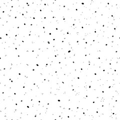 Abstract black and white polka dots. Adorable hand drawn background with a fun vibe. Festive and sweet design. Elegant and minimal dotty seamless pattern.