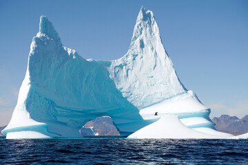 arctic iceberg floating on arctic ocean in greenland