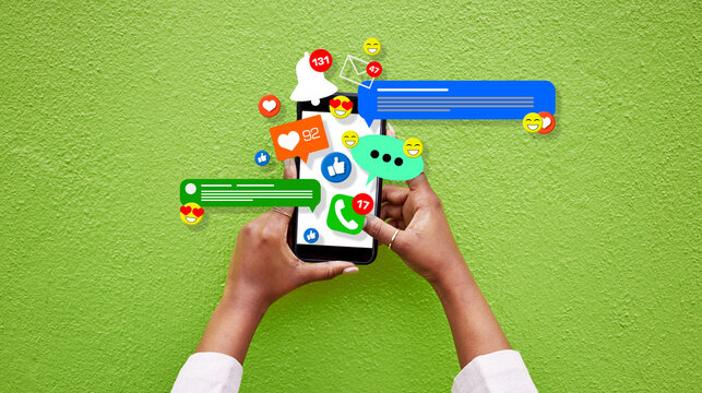Phone, person hands and social media emojis for online network, contact or application feedback. Cellphone, closeup and user typing post, communication and like notification on green background wall