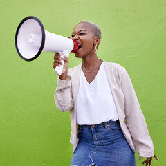 Black woman, megaphone and loudspeaker on mockup space in advertising or protest against a studio background. African female person screaming in bullhorn or shouting for sale discount, vote or alert - obrazy, fototapety, plakaty