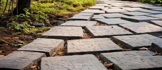 Durable materials like stone or concrete shape tuff tiles used on footpaths