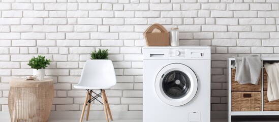 Contemporary washing machine in brick walled laundry room room for text