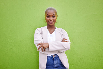 Portrait, fashion and happy black woman with arms crossed on green wall background mockup space....