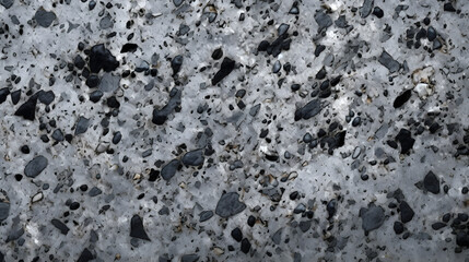 Dotted and speckled granite surface with a rough texture