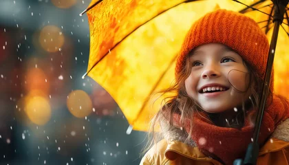 Fotobehang positive girl smiling wearing raincoat jacket with a hood enjoying the rain with umbrella outdoors © terra.incognita