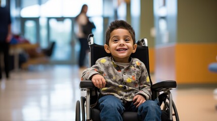 Inclusiveness and accessibility of healthcare facilities for children with disabilities. Disabled boy in a wheelchair in the hospital