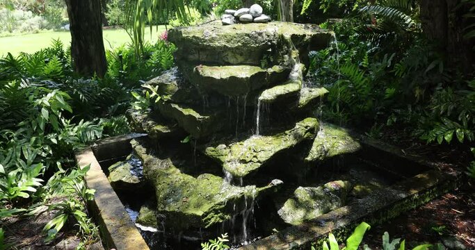 Decorative rock slob fountain in Miami Beach Botanical garden, landscape design