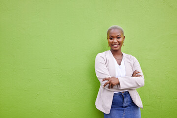 Portrait, fashion and black woman smile with arms crossed on green wall background mockup space....