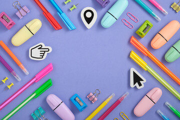 Frame of colorful school and office stationery set on purple background. Cursor, hand, point-shaped erasers. Flatly.