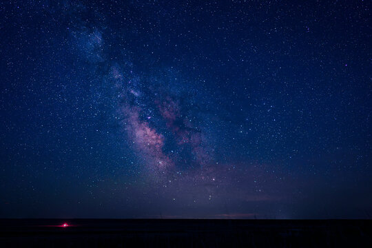 Milky Way galaxy center stars in pink and blue dark sky wyoming astrophotography astro space science