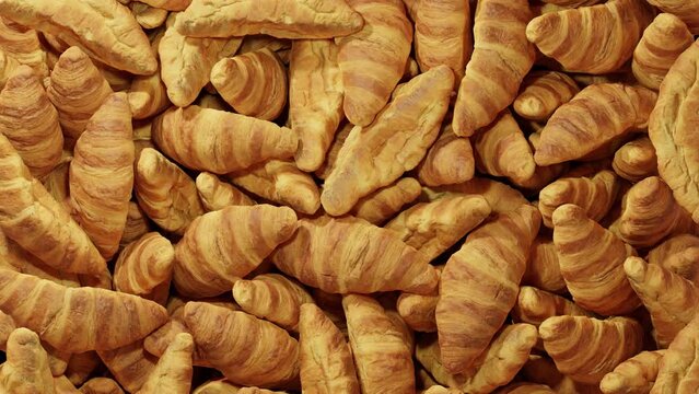 Ton of Croissants drop and fill up the screen, then explode.