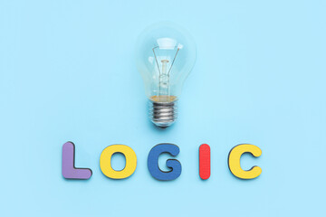 Word LOGIC with light bulb on blue background
