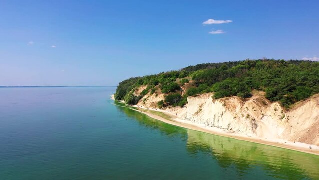 Ukraine, View from the mountain Pivikha on the Kremenchuk water reservoir near Svitlovodsk, Kirovograd region, Ukraine. Natural background in a sunny summer day.