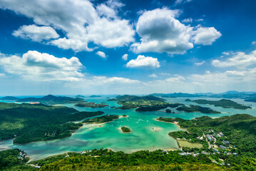 Fototapeta na wymiar landscape with lake and mountains of Tsam Chuk Wan from Tai Tun