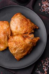 Delicious grilled chicken thighs with salt, spices and herbs