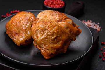 Delicious grilled chicken thighs with salt, spices and herbs