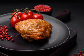 Delicious grilled chicken thighs with salt, spices and herbs