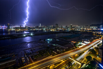 view of the city with lightening