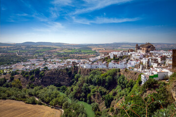 View of the white village of Arcos de La Frontera, Cádiz, Andalusia, Spain, on top of a hill - obrazy, fototapety, plakaty