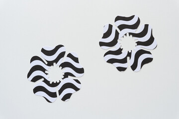 two optical illusion flowers on blank paper