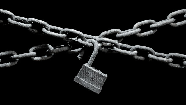 Worn rusted chain and open pad lock on black background. Conceptual freedom, weak link, or unprotected security system.